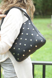 THE STUDDED PURSE