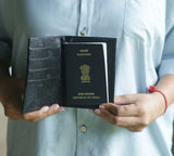 THE BLACK PASSPORT HOLDER