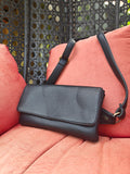 The multi zip black bag ( with a secret zip )